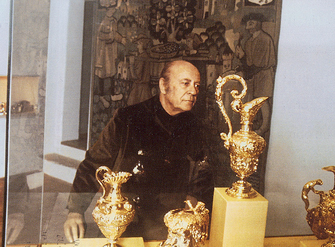 <p>Baron Philippe contemplating pieces of 17th century German gold artwork, prized items in the Museum of Wine in Art.</p>
